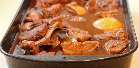 Pork and Simmering Liquid Ready for Oven Roasting